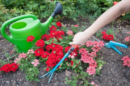 Pressure washing team preparing equipment at a property